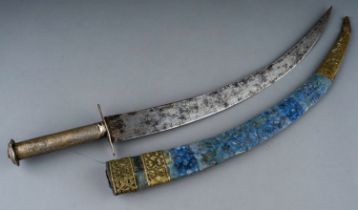 Antique North African dagger, white metal hilt possibly silver, velvet covered scabbard with brass
