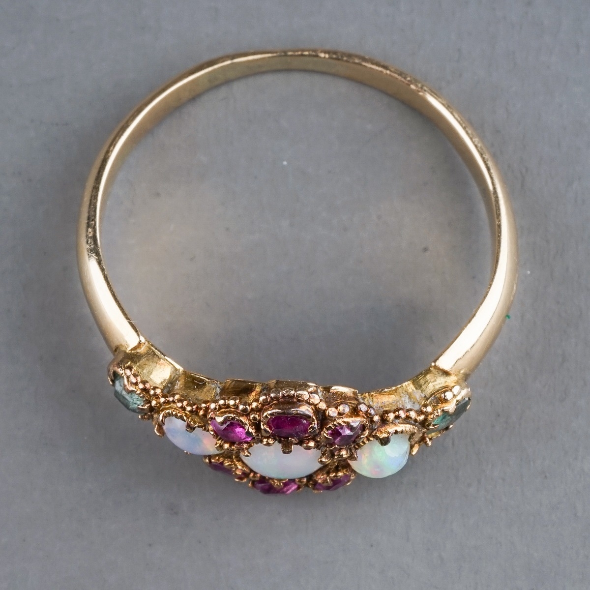 An early 20th century yellow gold opal cluster ring, set with three round cabochon opals within a - Image 3 of 3