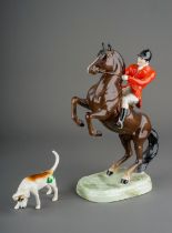 A Beswick model no 868 of a huntsman on a rearing brown horse, printed and impressed marks to