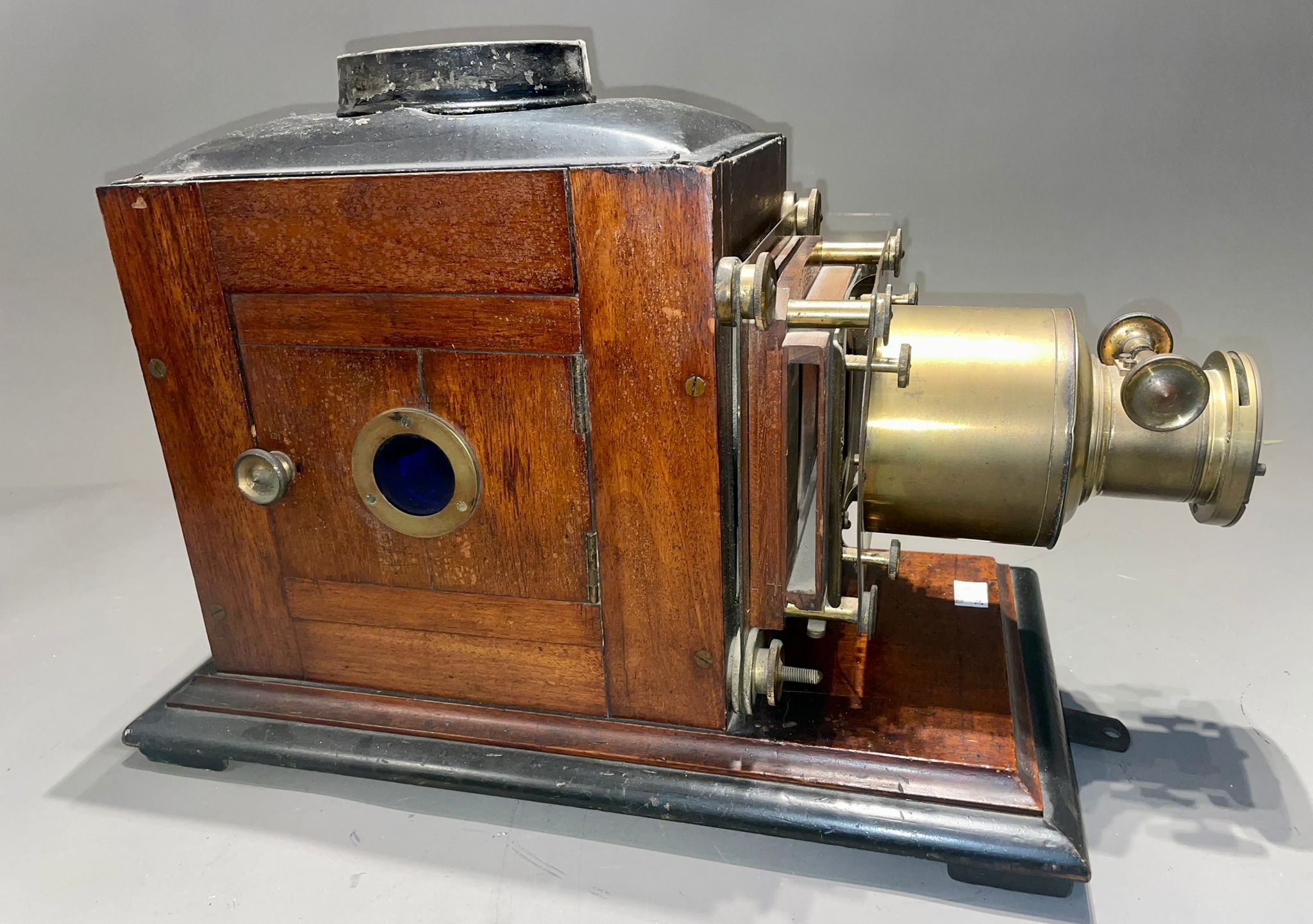 An early 20th Century mahogany and brass magic lantern