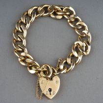 A 9ct yellow gold heavy gauge flat curb-link bracelet, padlock clasp, total gross weight approx 47.