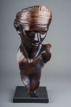 A Contemporary bronzed decorative bust of a Woman with headdress, on marble plinth, unsigned, approx