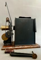 An early 20th Century hand crank 35mm Projector