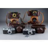 4 German marked cameras in their original carry cases. Militaria interest