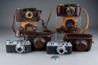 4 German marked cameras in their original carry cases. Militaria interest