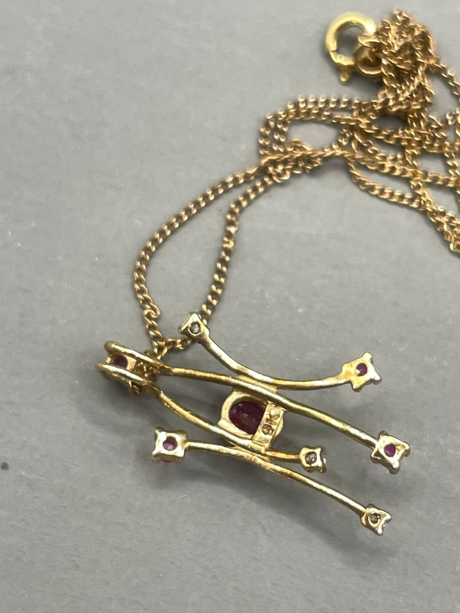 A 9k yellow gold ruby and diamond pendant necklace, gross weight approx 1.4g - Image 3 of 3