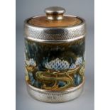 An Art Nouveau Royal Doulton silver-mounted cylindrical tobacco jar and cover, raised sinuous floral