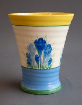 A Clarice Cliff "Crocus" pattern vase, the tapering body painted with blue crocuses, yellow