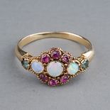 An early 20th century yellow gold opal cluster ring, set with three round cabochon opals within a