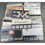 Approximately 200 Post Office stamp mint packs mainly 1990's