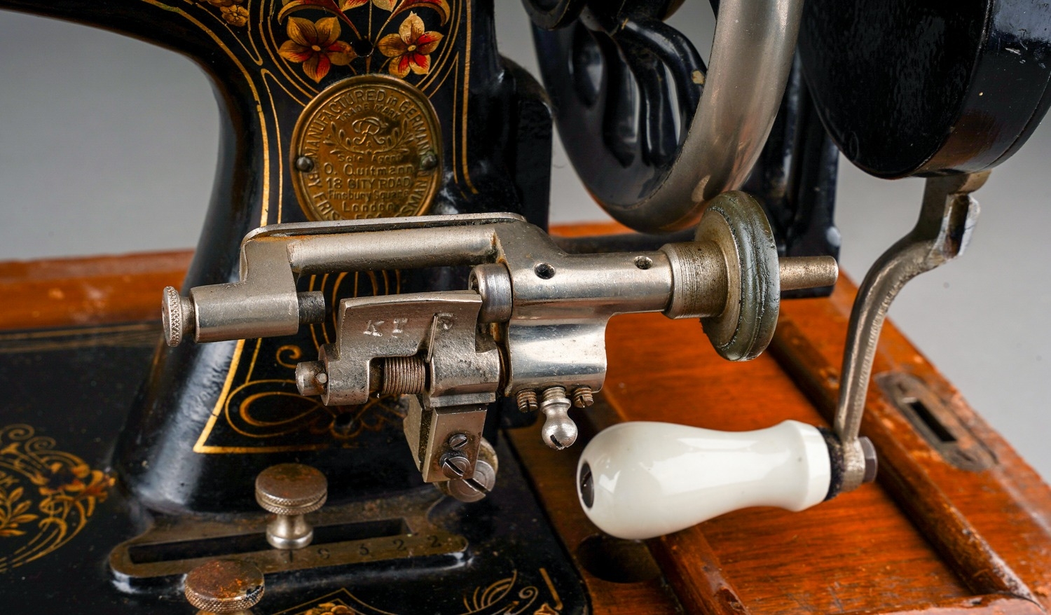 An early 20th Century cased Frister & Rossman black and gilt cranked sewing machine, the stand - Image 4 of 7