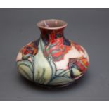 A Moorcroft Red Tulip squat vase with WM monogram and printed marks to base, 11cm high.