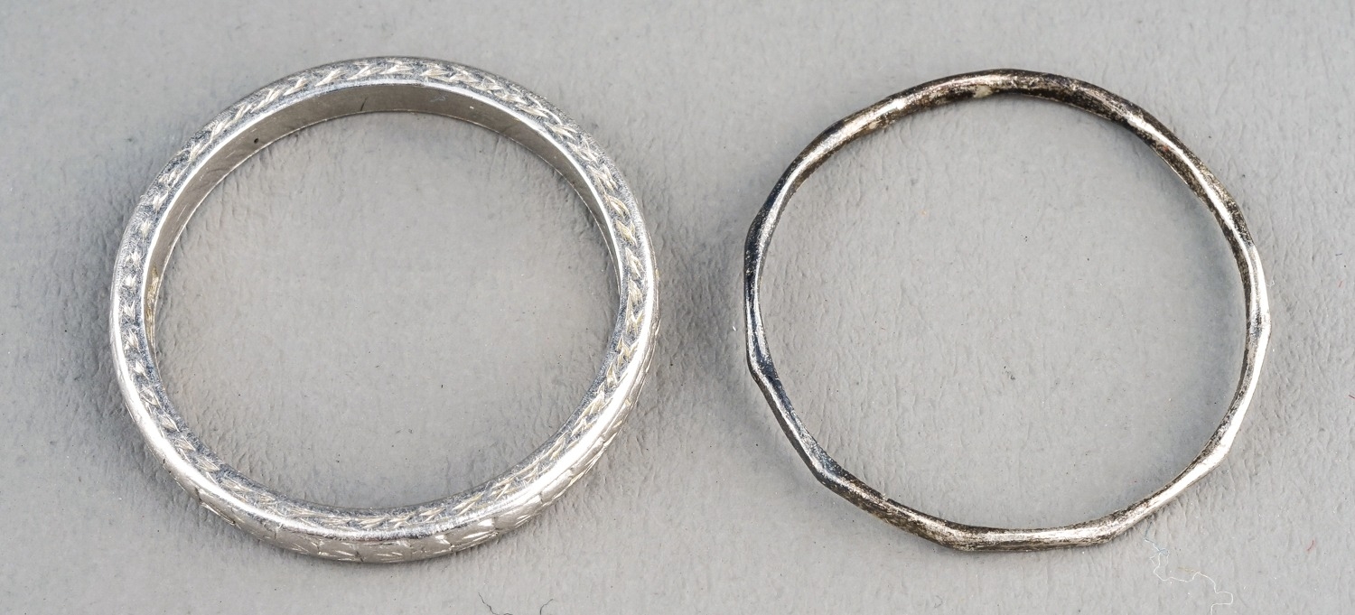 A platinum band, engraved detail, size M, gross weight approx 3.6g; together with a white metal ring - Image 4 of 6