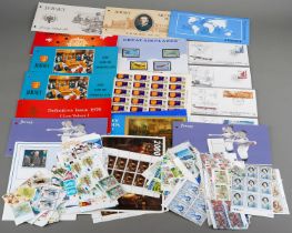 A group of Jersey Mint stamp booklets and a collection of Jersey and GB Mint stamps to include
