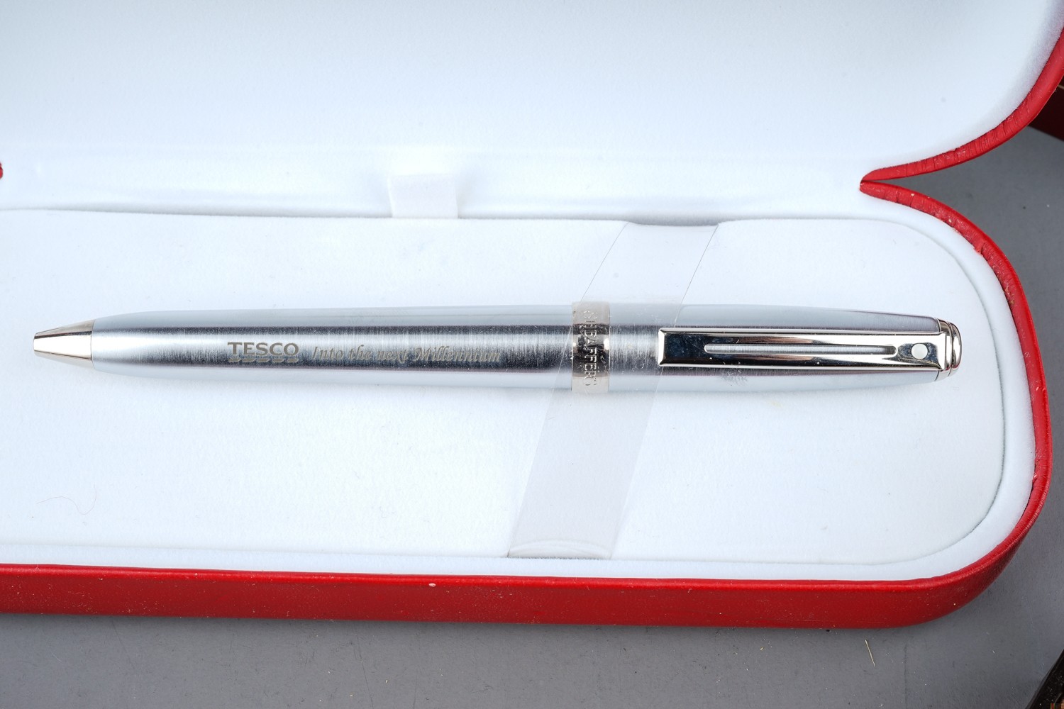 A Sheaffer fountain pen, 14k gold nib, boxed; a Sheaffer roller ball pen, boxed; a parker ball point