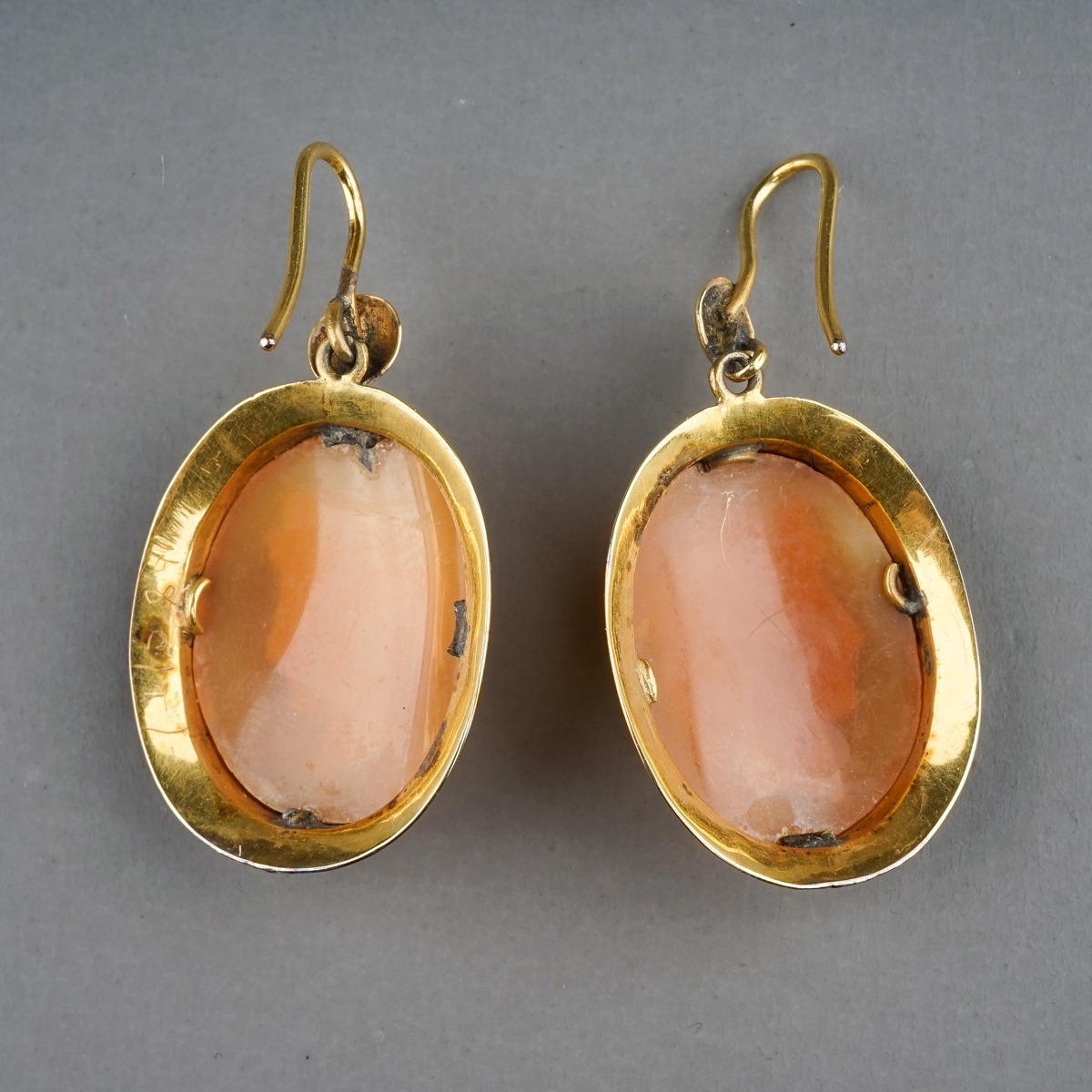 A pair of 19th century yellow gold and cameo earrings, set with shell cameos carved depicting - Image 3 of 3