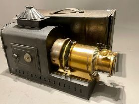 A late 19th Century tin plate and brass magic lantern with Stocks patent lamp, in tinplate