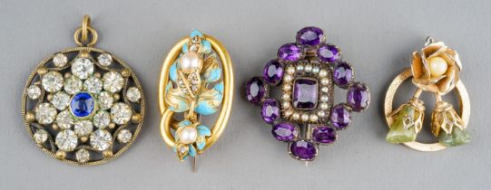 A Georgian yellow metal paste and seed pearl brooch, set with oval amethyst glass and a border of