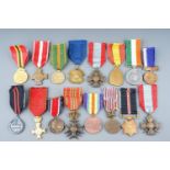A Collection of World Medals 16 in total. French, Belgian, Pakistani, Italian etc. Conditions VF+