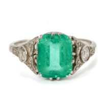 An Art Deco platinum green stone and diamond ring