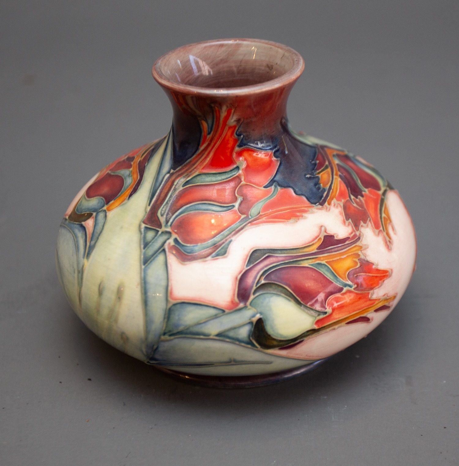 A Moorcroft Red Tulip squat vase with WM monogram and printed marks to base, 11cm high. - Image 2 of 3