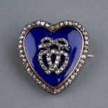 A late 19th century diamond and enamel heart shaped brooch/pendant, the blue enamel heart set with