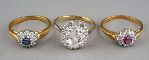 A 9ct yellow gold and clear paste dressing ring, size Q, gross weight approx 3g; together with two