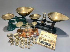 Three early 20th Century brass mounted weighing scales with various weights (a/f)