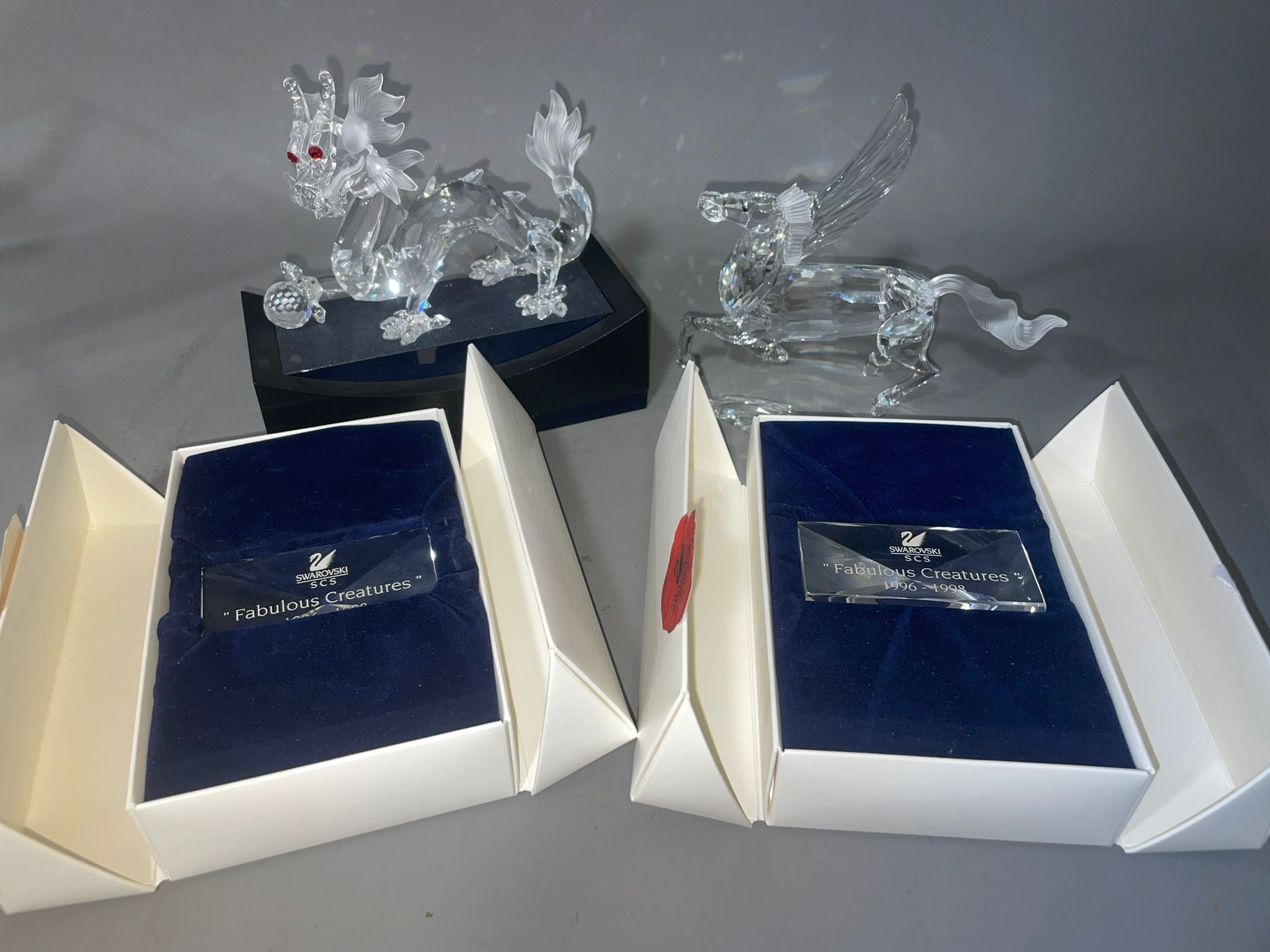 Two Swarovski Collector Society crystal Fabulous Creatures to include: The Dragon 1997 and The