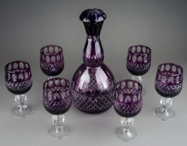 A set of six Sapska Fabrika Stakla Paracin amethyst wine glass with matching decanter and stopper (