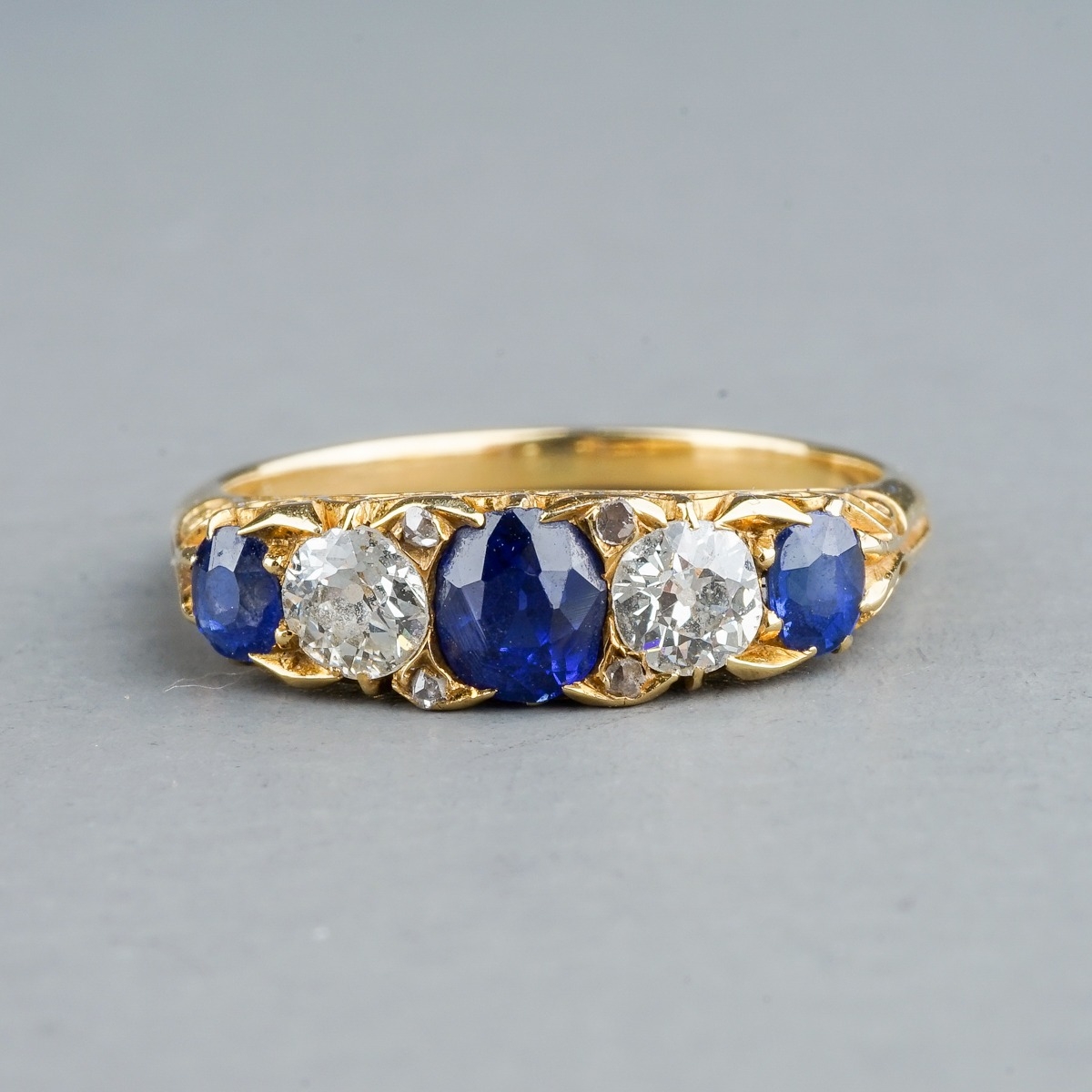 An Edwardian yellow gold sapphire and diamond five-stone ring, size L, unmarked assessed as approx - Image 2 of 4