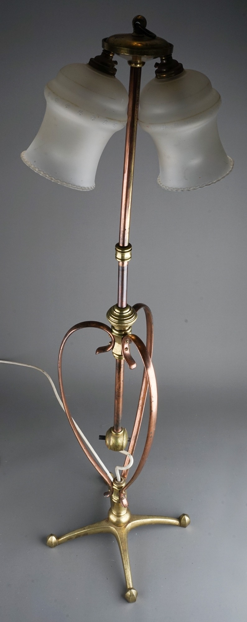 W A S Benson brass twin light adjustable reading lamp, on splayed base