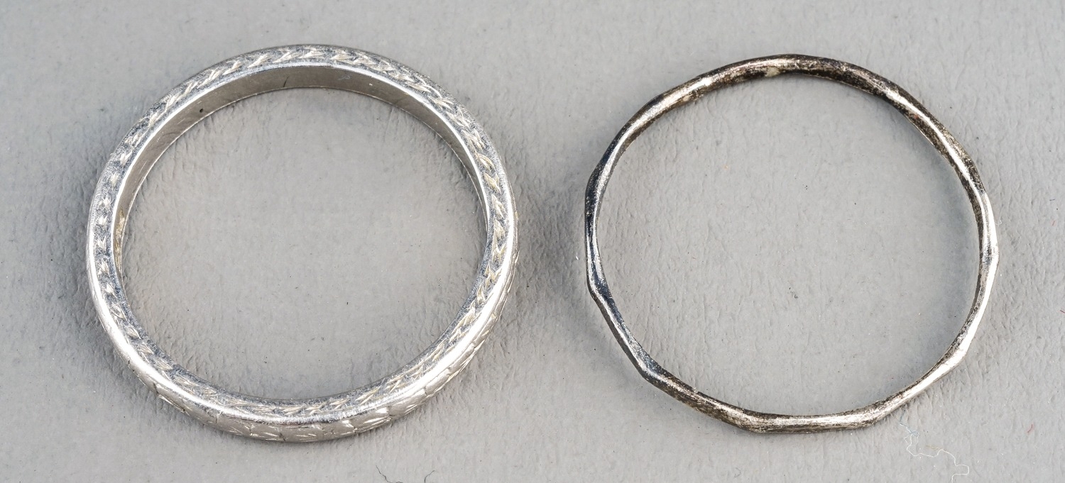 A platinum band, engraved detail, size M, gross weight approx 3.6g; together with a white metal ring - Image 3 of 6