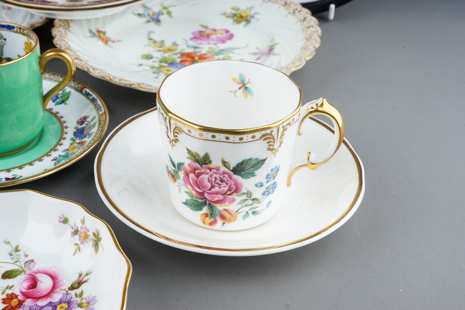 A collection of ceramics to include Dresden porcelain plates, Royal Crown Derby plates, cups, - Image 8 of 20