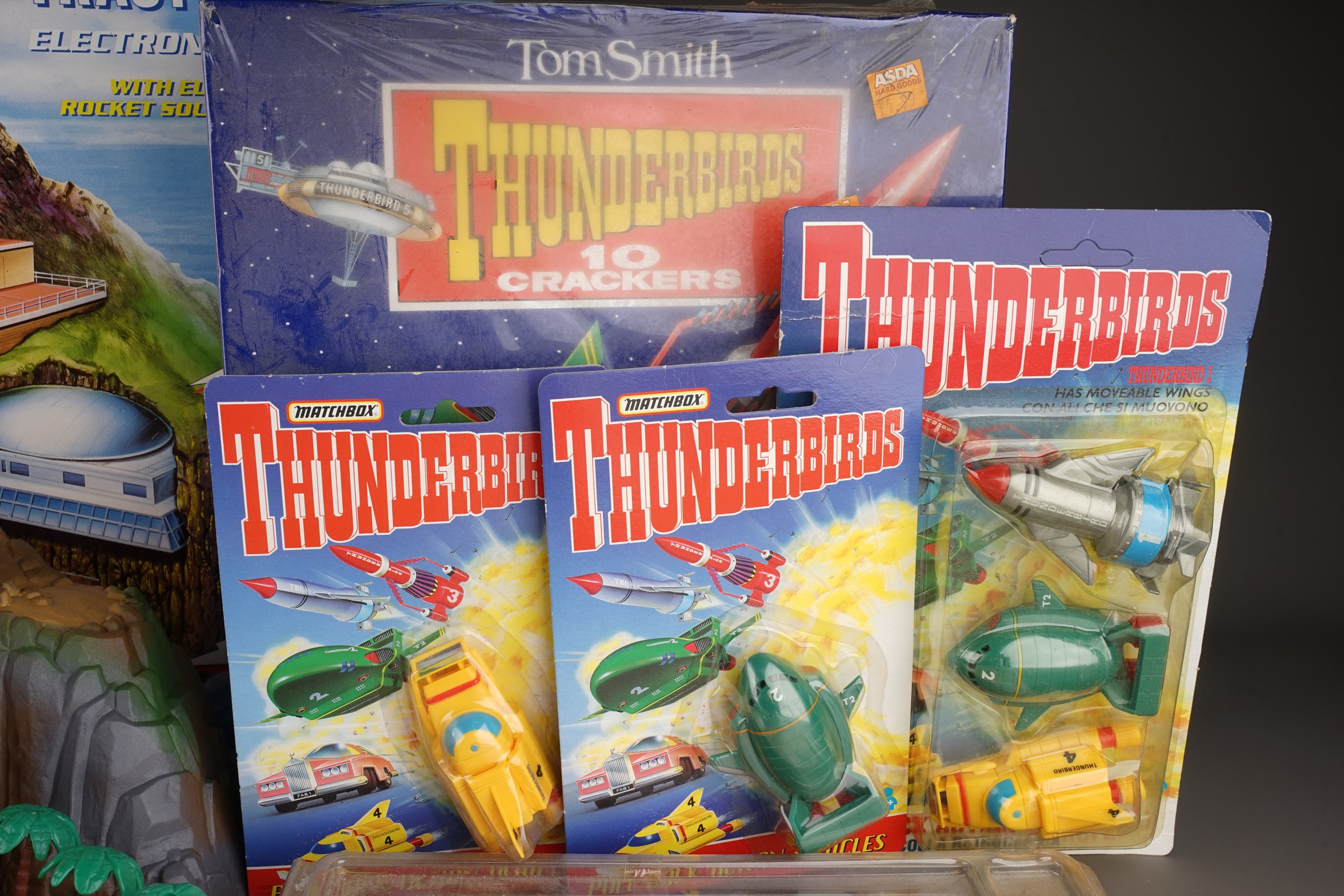 Collection of Thunderbirds toys to include boxed Tracy island, crackers, figures, posters, coins, - Image 3 of 7