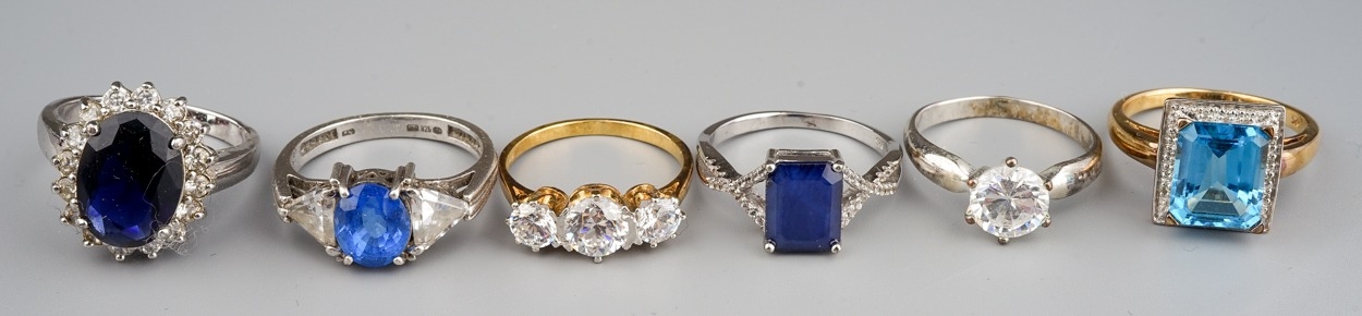 A collection of six gem-set dress rings, including silver and silver-gilt (6)