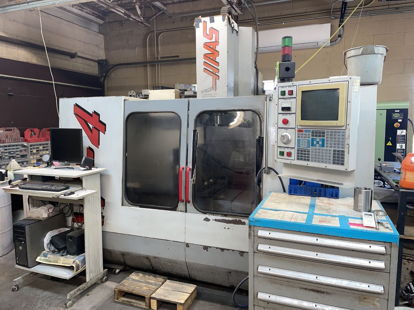 Timed On-Line Auction of a Precision Machining Job Shop