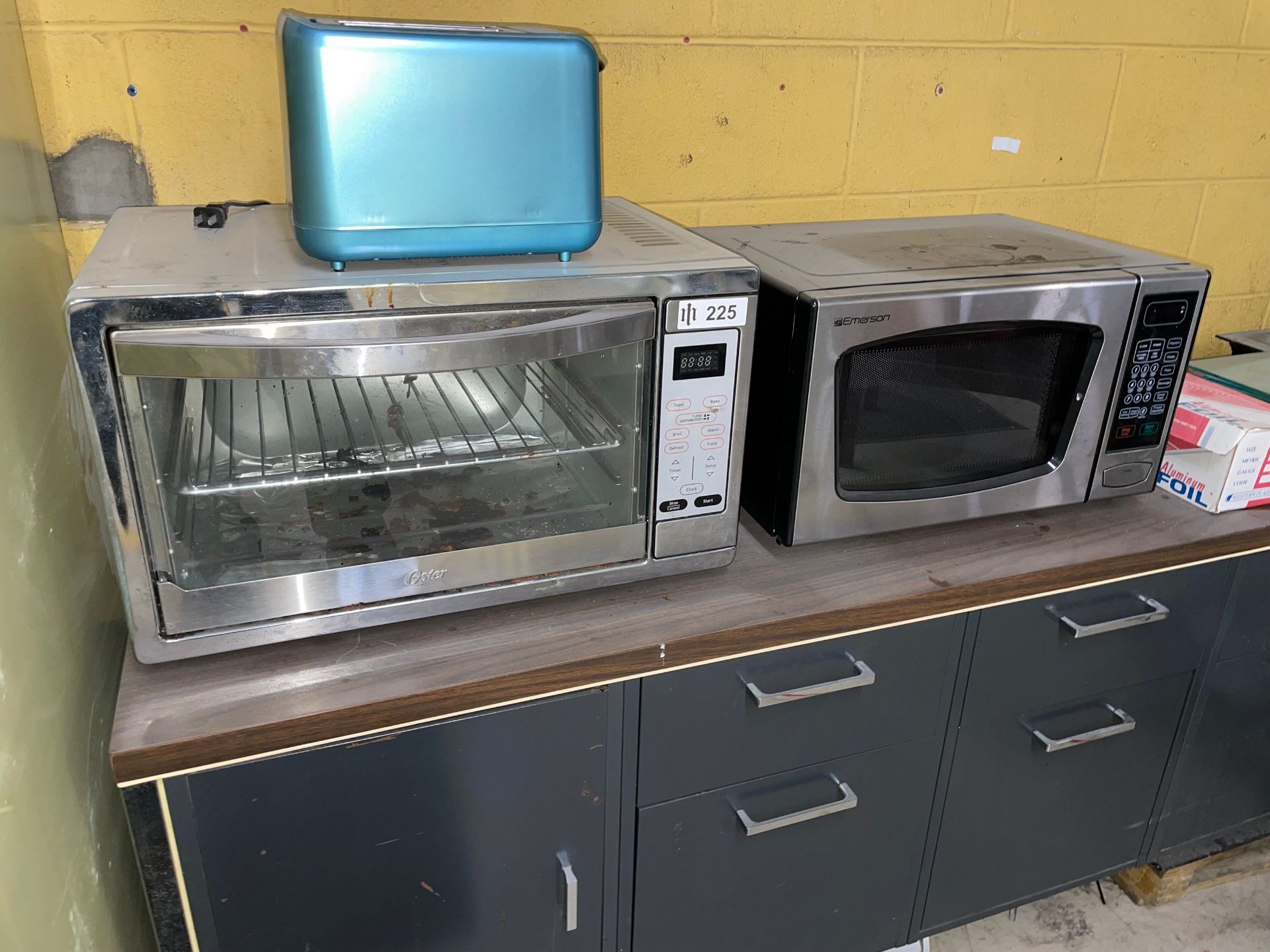 Lot including Oster Toaster Over, Emerson Microwave and Toaster