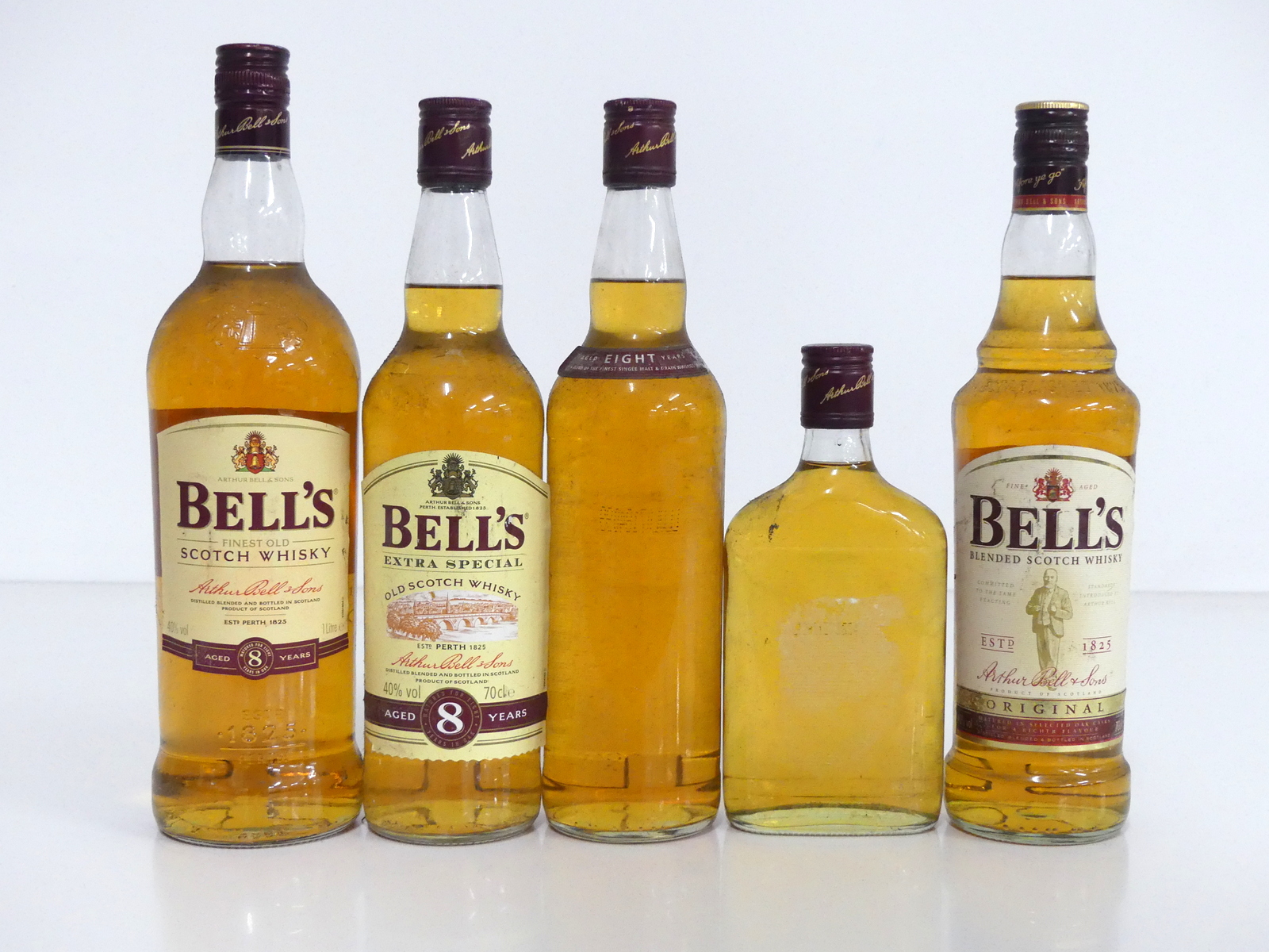 1 litre bt Bells 8YO Whisky 40% sl bs 2 70-cl bts Bells 8YO Whisky 40% 1 missing label sl bs 1 37.