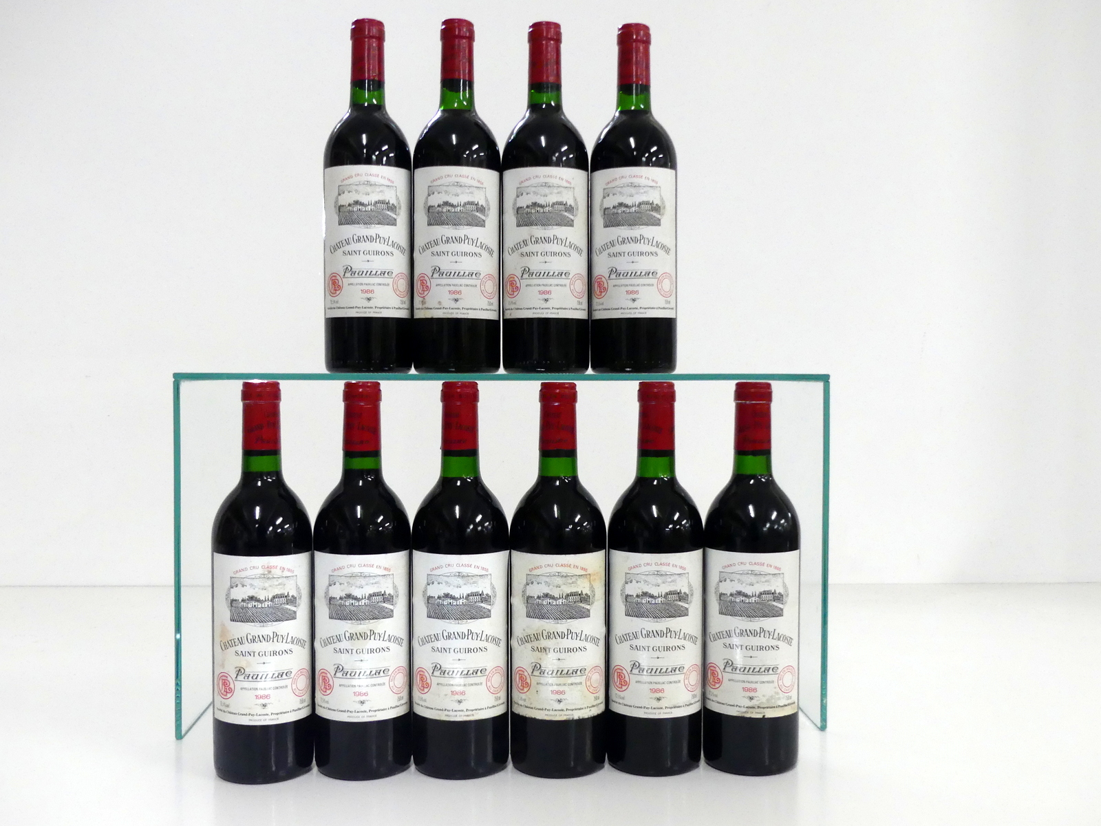 10 bts Ch. Grand-Puy-Lacoste 1986 Pauillac Grand Cru Classé 5 i.n, 4 vts, 1 ts, sl stl