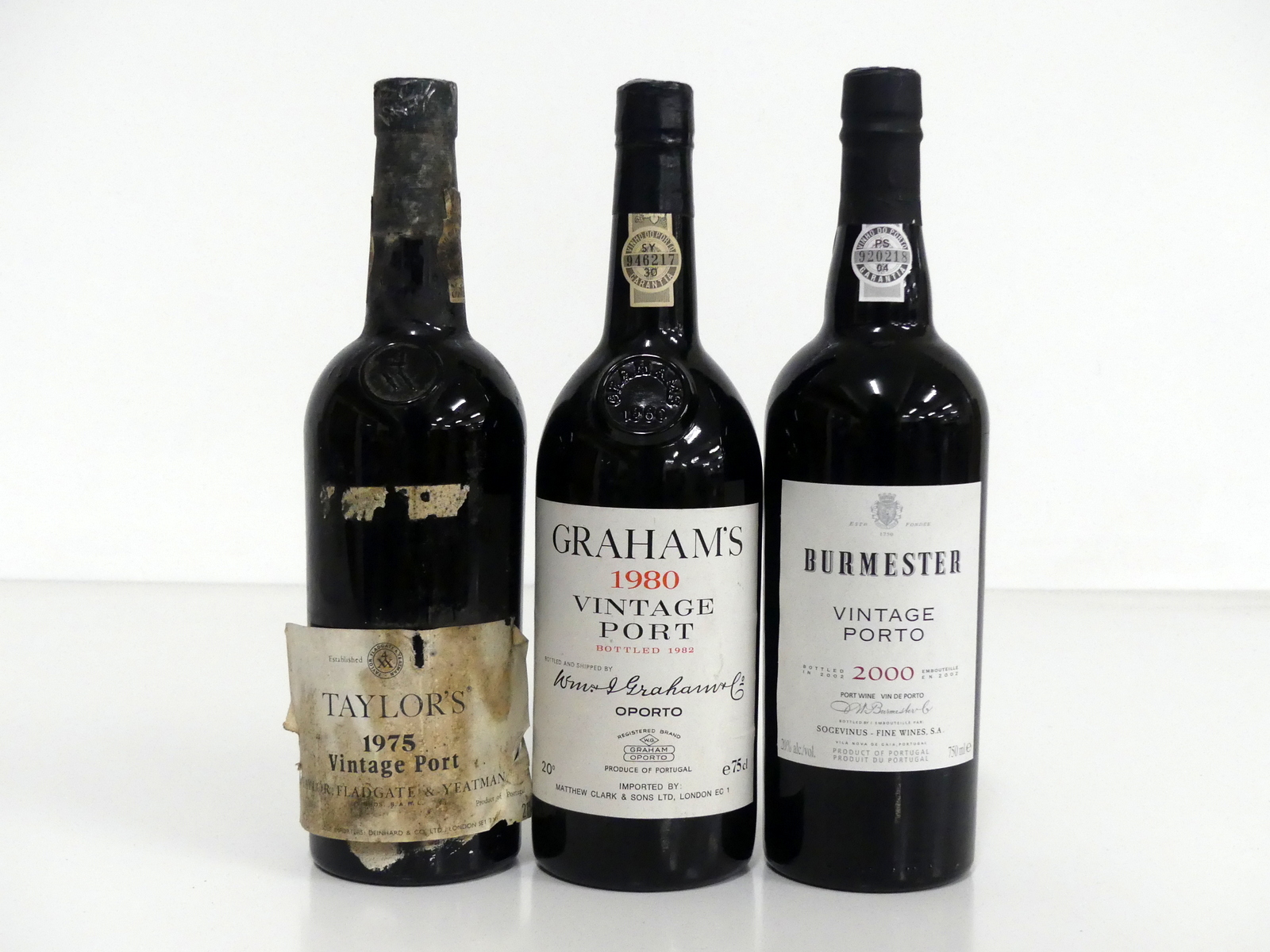 1 bt Taylors 1975 Vintage Port i.n, sl bs, sl loose label 1 bt Grahams 1980 Vintage Port 1 bt