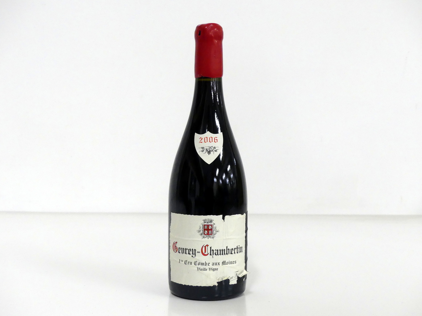 1 bt Gevrey-Chambertin 1er Cru Combe Aux Moines V.V. 2006 Dom Fourrier hf/i.n, sl torn label, vsl