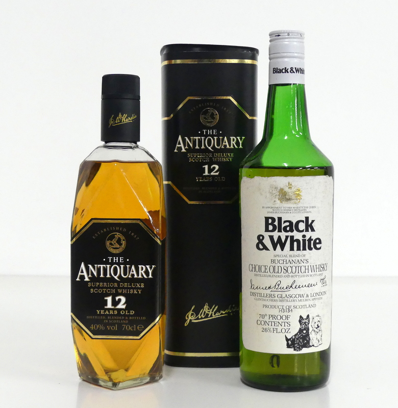 1 70-cl bt The Antiquary 12YO Superior Deluxe Scotch Whisky 40% 1 26 2/3 fl oz bt Black & White