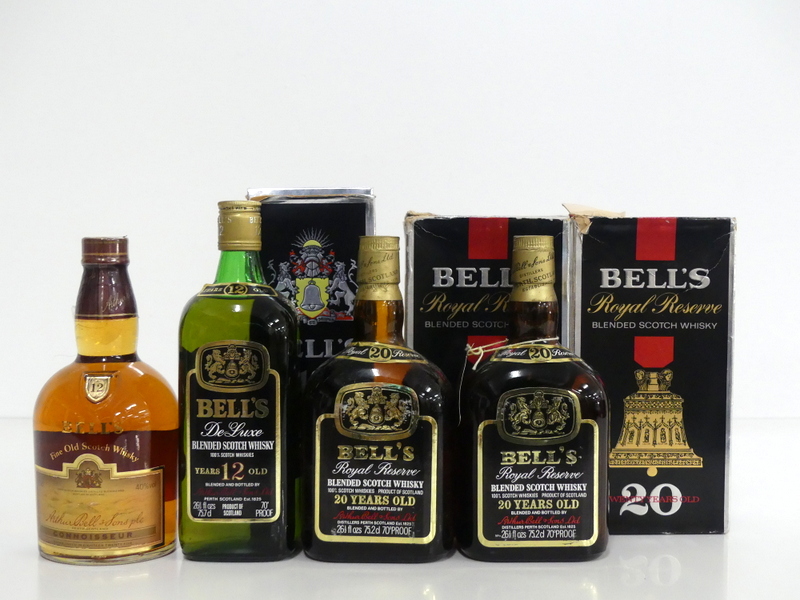 1 75-cl bt Bells Connoiseur 12YO Fine Old Scotch Whisky 40% 1 26 2/3 fl oz bt Bells de Luxe 12YO