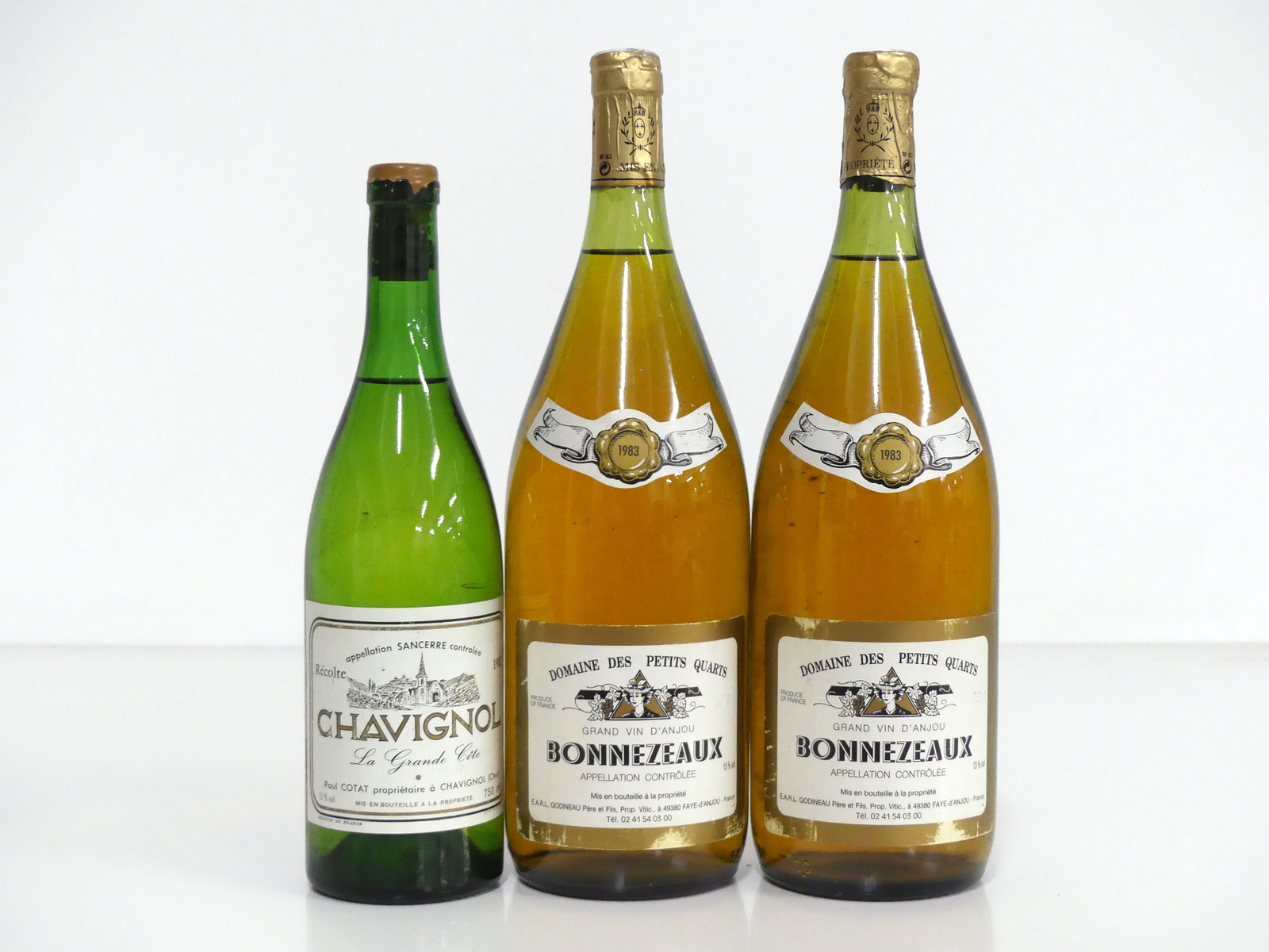 1 bt Chavignol La Grande Côte Sancerre 1982 ms/us, chipped wax 2 magnums Dom des Petits Quarts