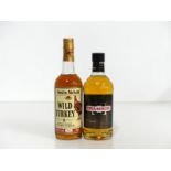 1 70-cl bt Wild Turkey Bourbon 43.4% 1 70-cl bt Drambuie 40% Above 2 70-cl bottles