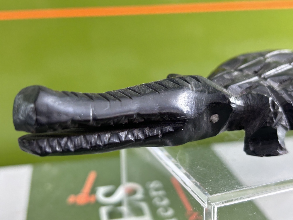 Interesting Hand Carved Alligator large Paperweight?