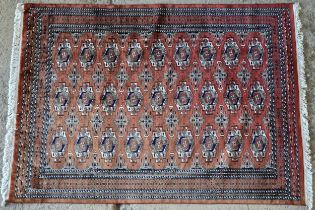 Good quality silk blend Bokhara carpet, red ground, L 231cm x W169cm