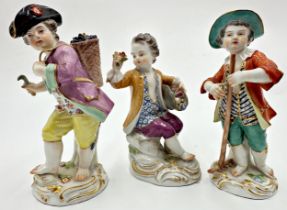 Three Meissen porcelain figures of grape picker, flower picker and gardener boys, 14cm high (3)