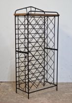 Contemporary black metal wine rack of arched form, H 131cm x W 63cm x D 32cm
